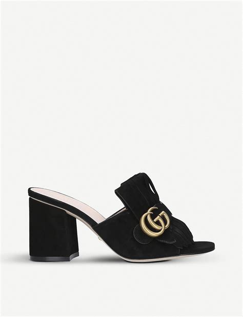 gucci suede mules.